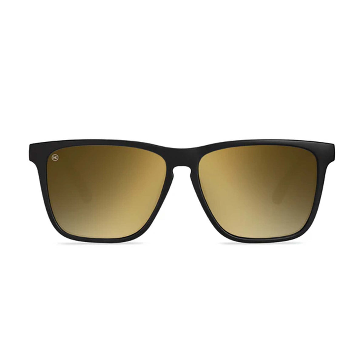 Black-framed sunglasses with gold gradient lenses on a white background
