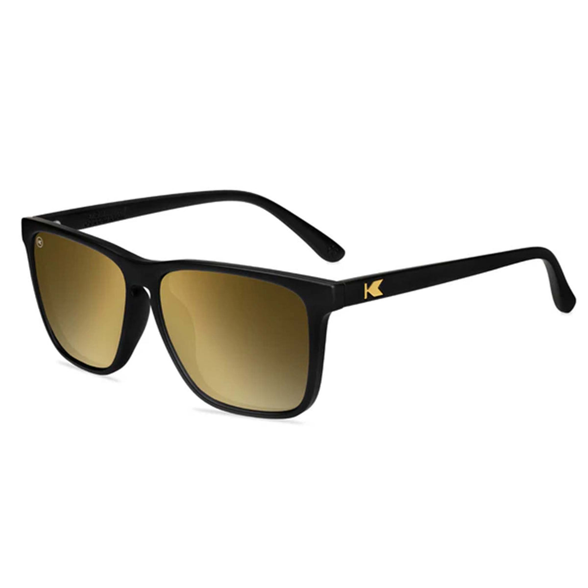 Black sunglasses with gold gradient lenses on a white background