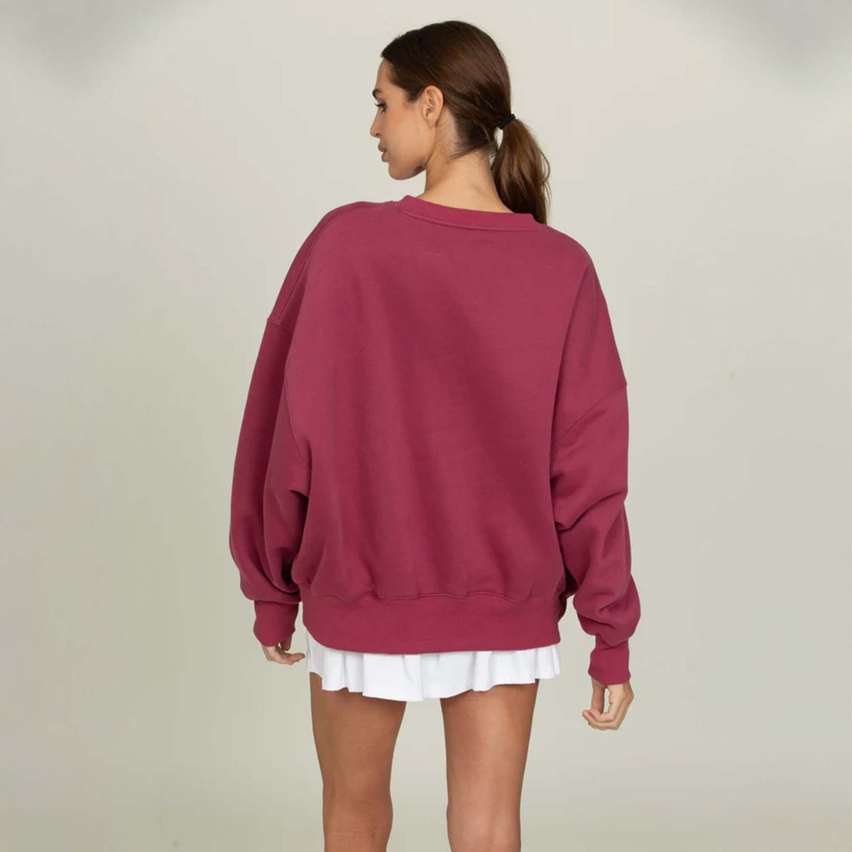 Gold Hinge Crewneck in pale mulberry with white arch logo across the chest.
