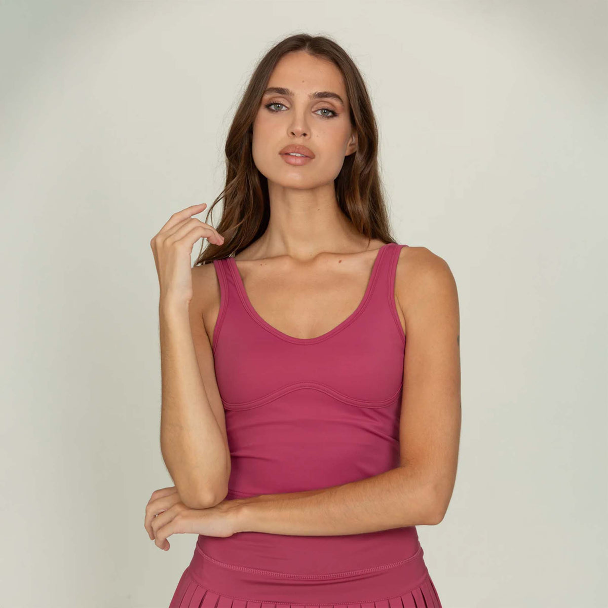 front view of Gold Hinge cropped tank in raspberry.