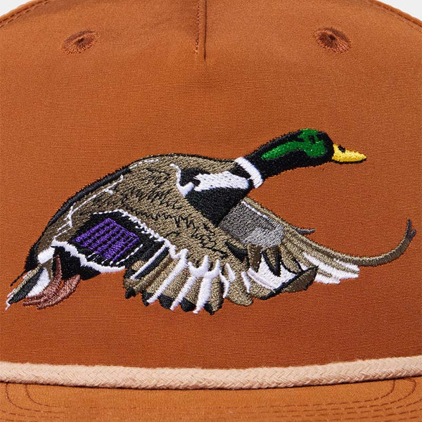 Close up view of Duck Camp embroidered flying mallard hat.