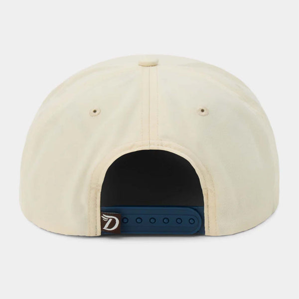 Back view of ivory Duck Camp hat with navy adjustable snapback closure and small logo tag.