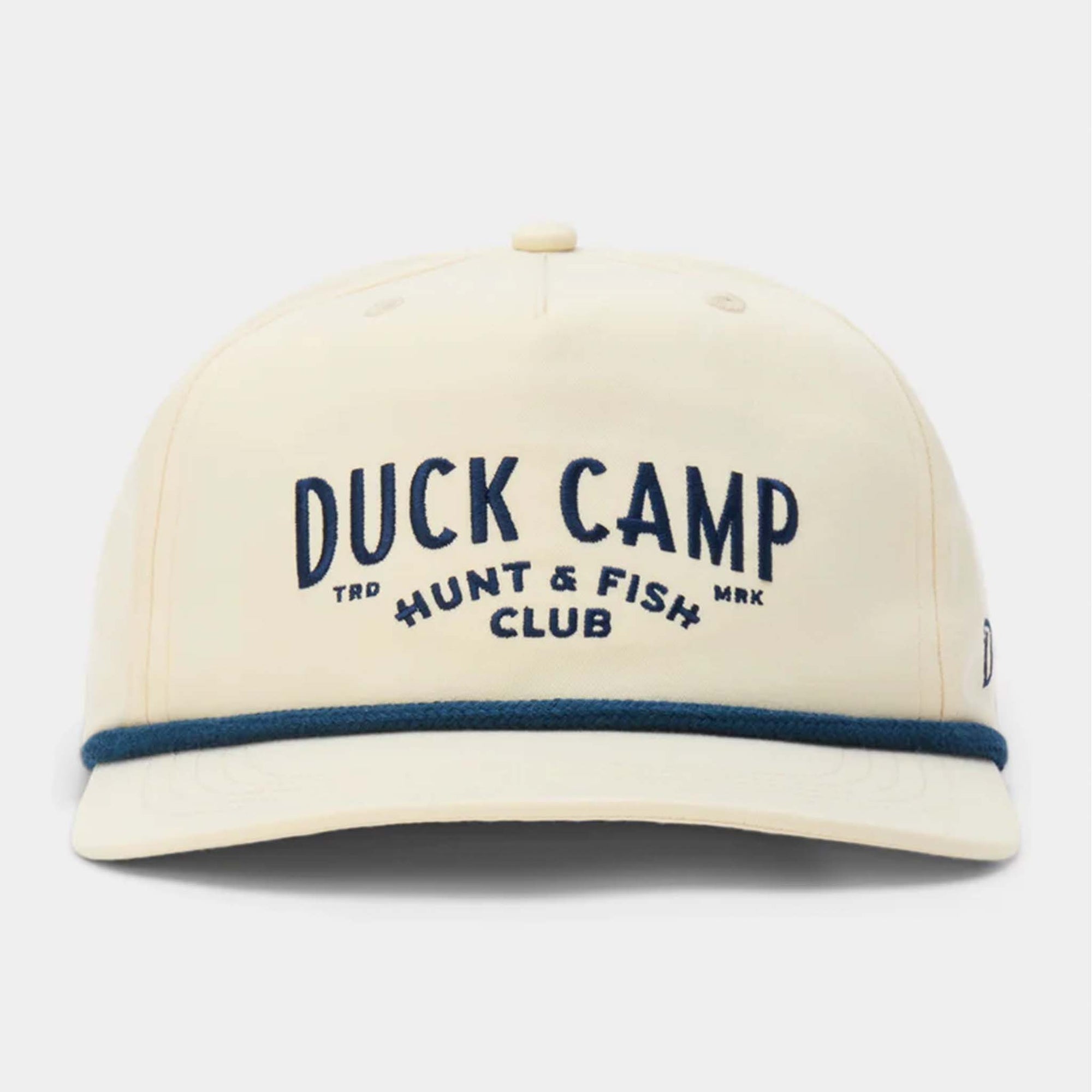 Front view of ivory Duck Camp hat with navy embroidered “Duck Camp Hunt & Fish Club” text and blue rope detail across the bill.
