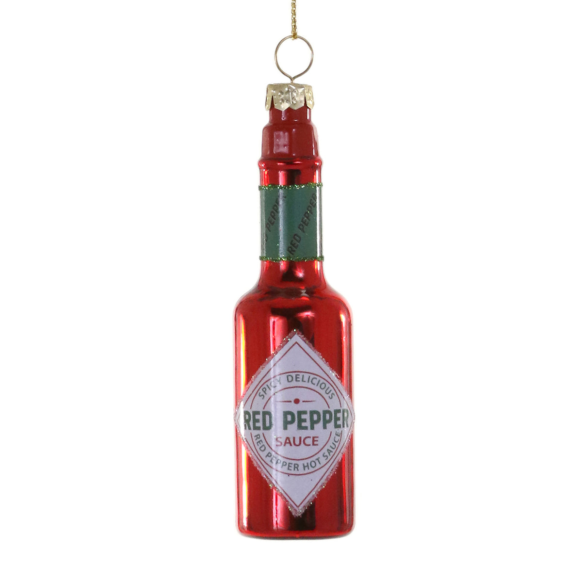 Red glass ornament shaped like a hot sauce bottle with green label and gold cap.