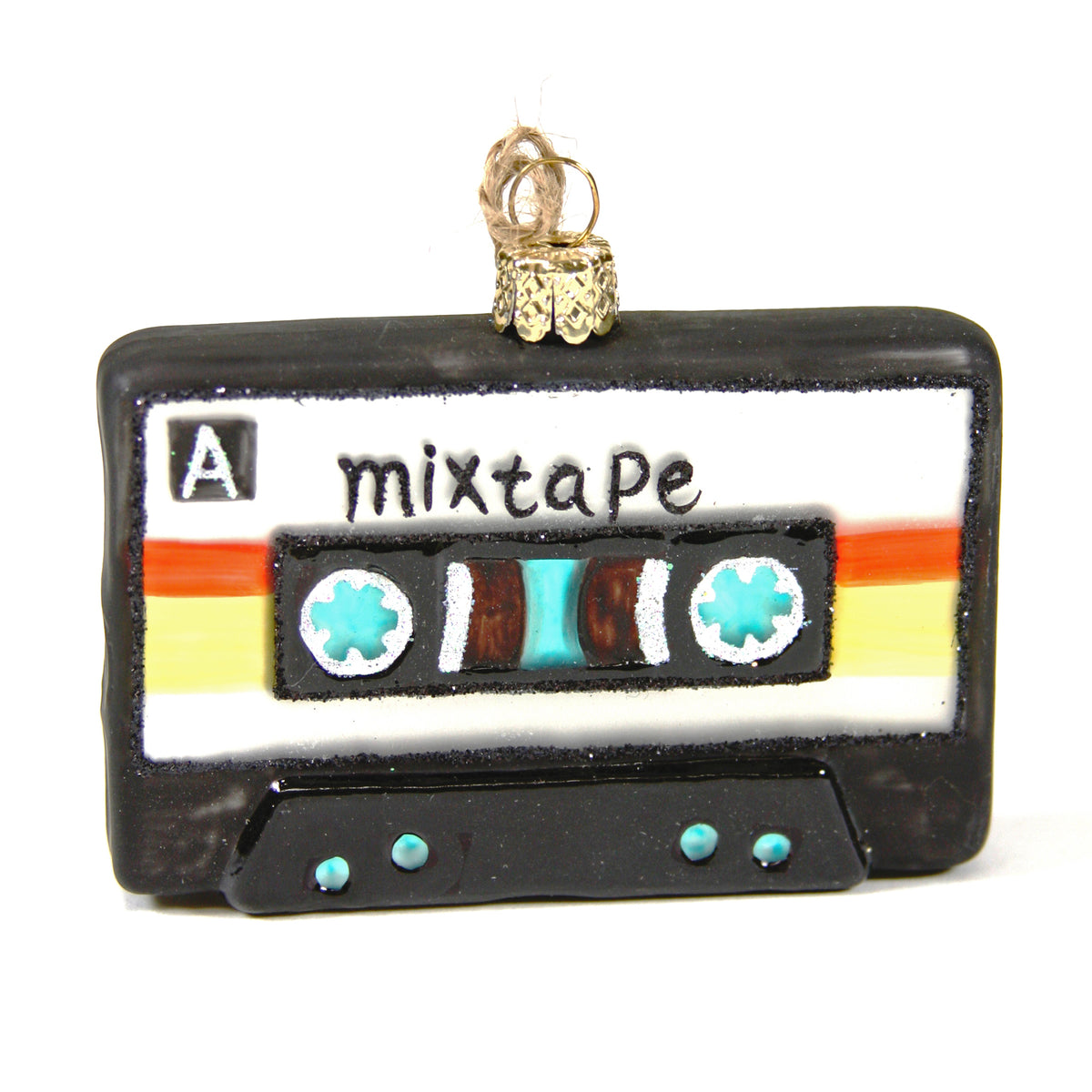 Black and white cassette tape ornament labeled “Mixtape” with red and yellow stripes.