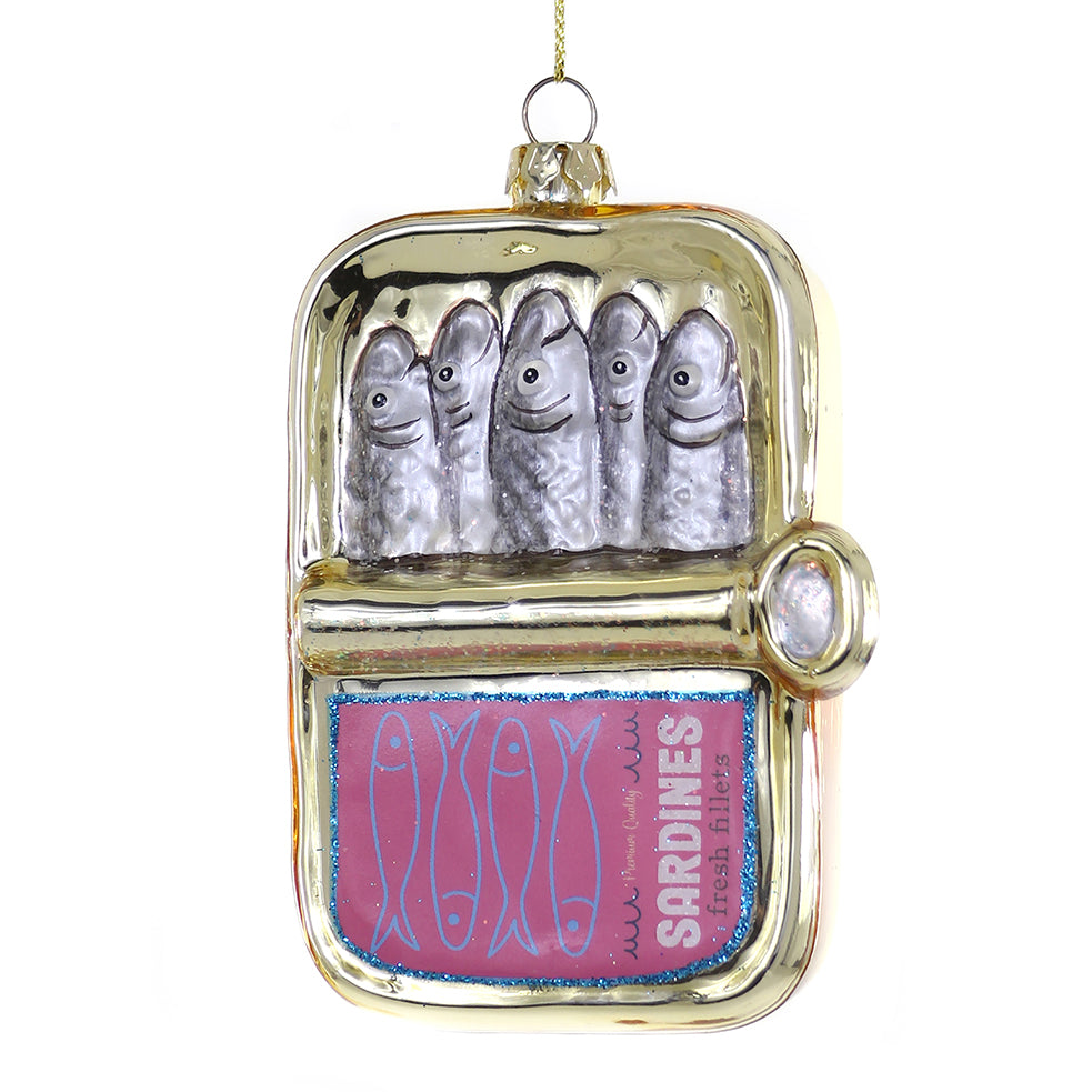 Decorative ornament shaped like a sardine can with sardines inside on a white background