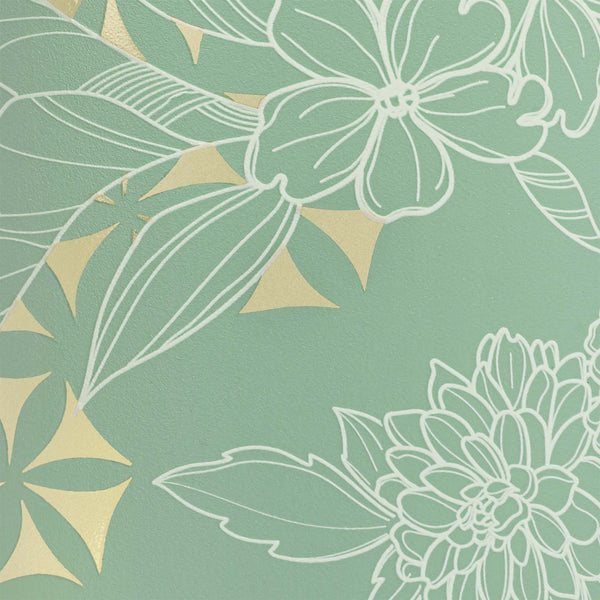 BrüMate Golden Bloom color swatch with soft sage green background, white floral line-art flowers and leaves, and subtle metallic gold geometric accents.