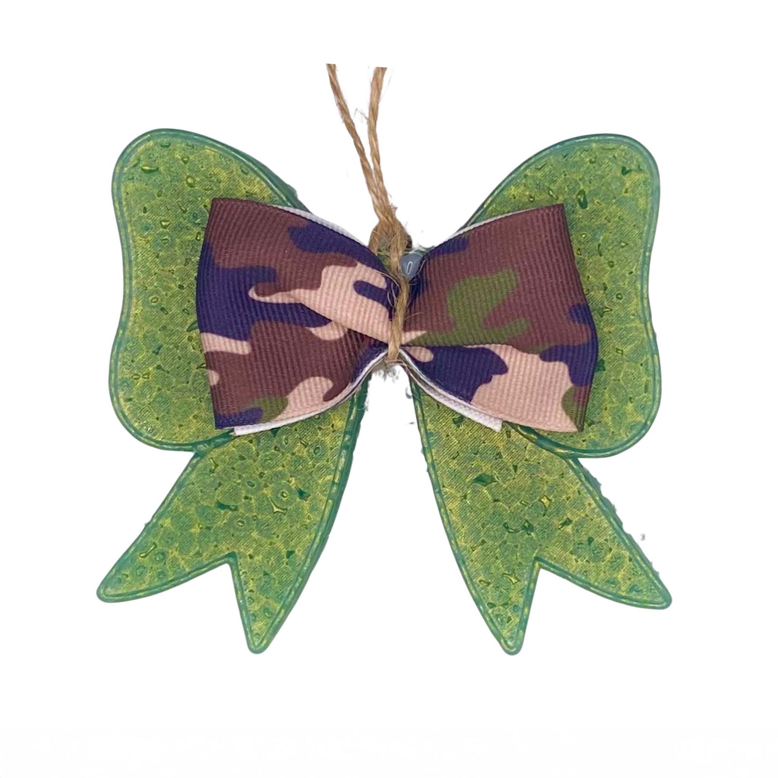 Funky Freshies Bow Air Freshener, color green with a camouflage print riboon bow tied to the front.
Funky Freshies by Funky Fleur De Lis hanging air freshener with a decorative bow shaped design, used to freshen spaces like cars, closets, bathrooms, and more; not edible and should be kept away from children and pets.
This Freshie comes ready to hang!
