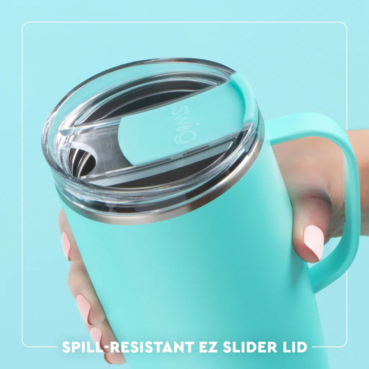 Close-up of light teal Swig Life 22oz travel mug showing spill-resistant EZ slider lid, held in hand.