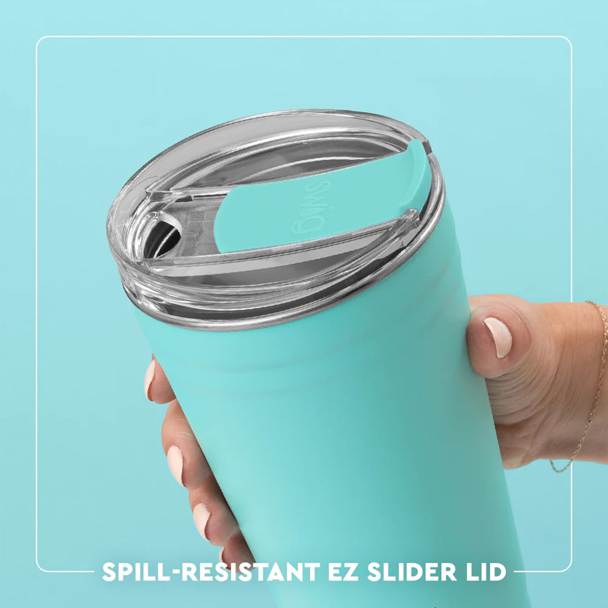 Close-up of light teal Swig Life party cup showing spill-resistant EZ slider lid, held in hand.