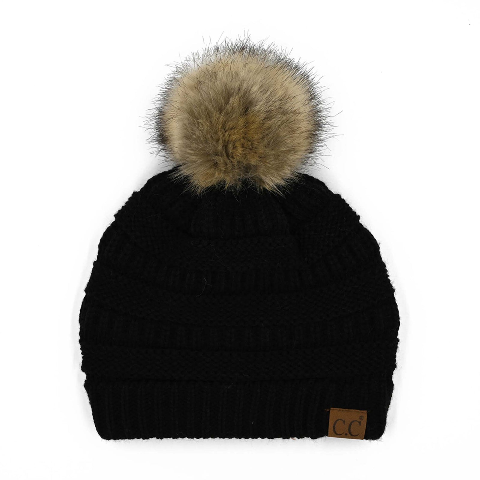 C.C knit beanie with tan faux fur pom on top and brown leather logo patch on the cuff, laid flat on a white background.