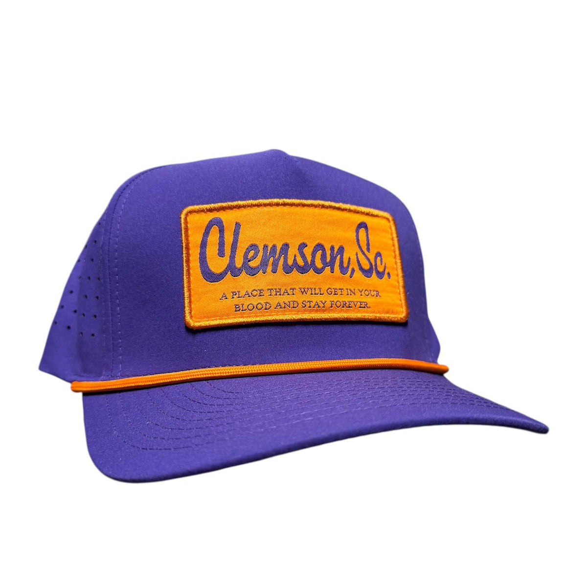 Purple cap with orange patch featuring 'Clemson, Sc.' text on a white background