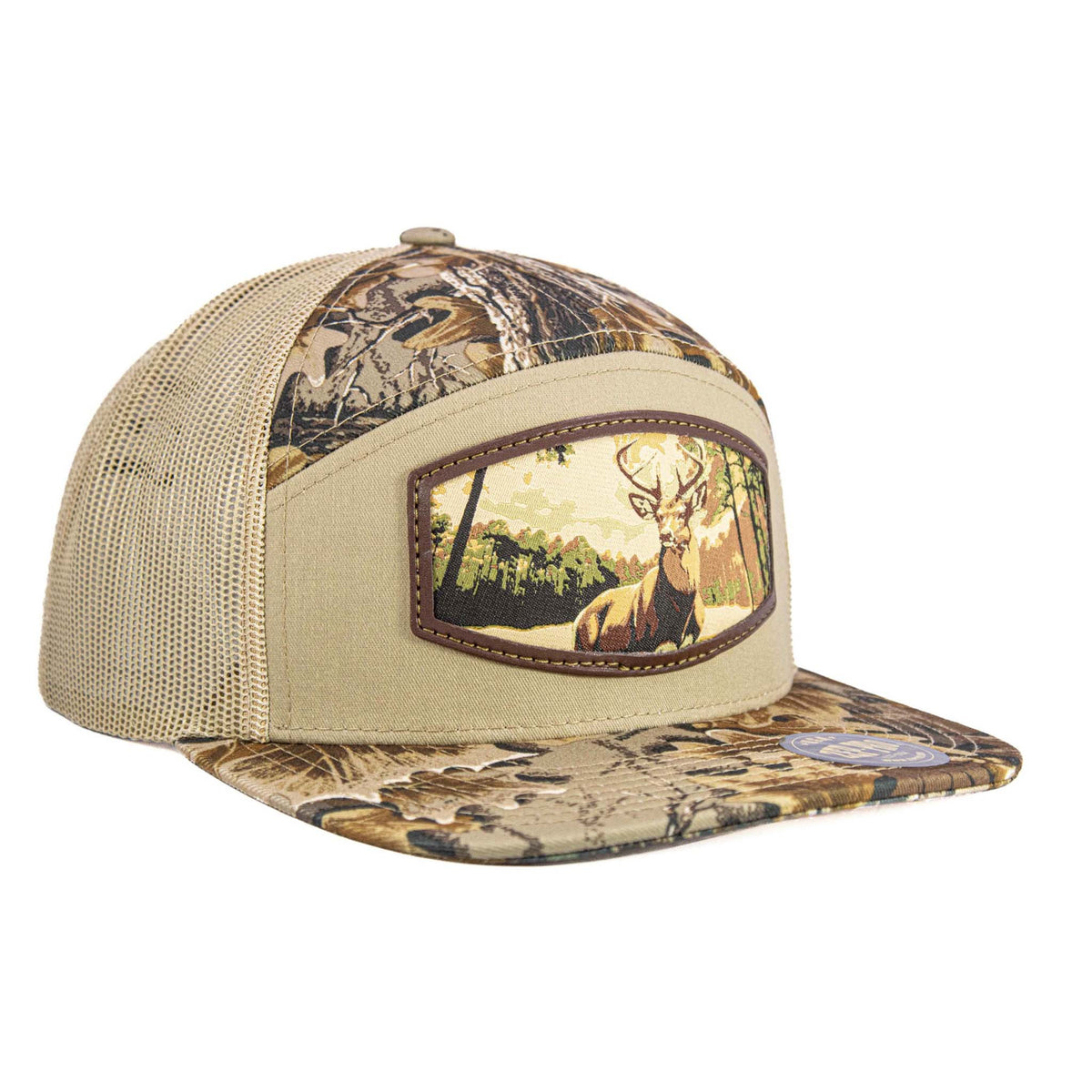 Khaki and Realtree camo 7-panel hat with mesh back and flat brim, featuring a burnished patch of a buck standing in a forest scene.