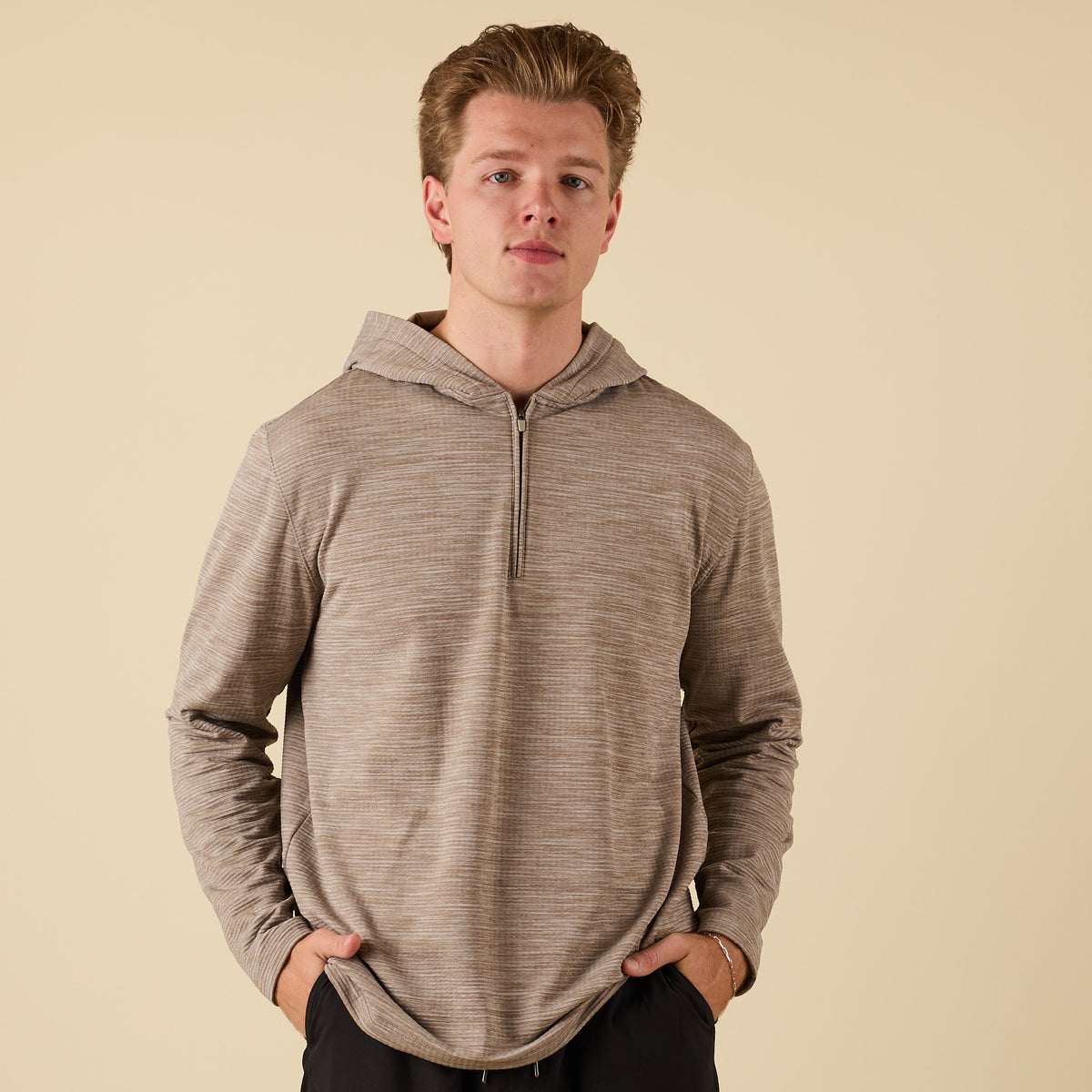 Front view of Coast Apparel Lightweight Performance Quarter Zip Hoodie in lentil brown