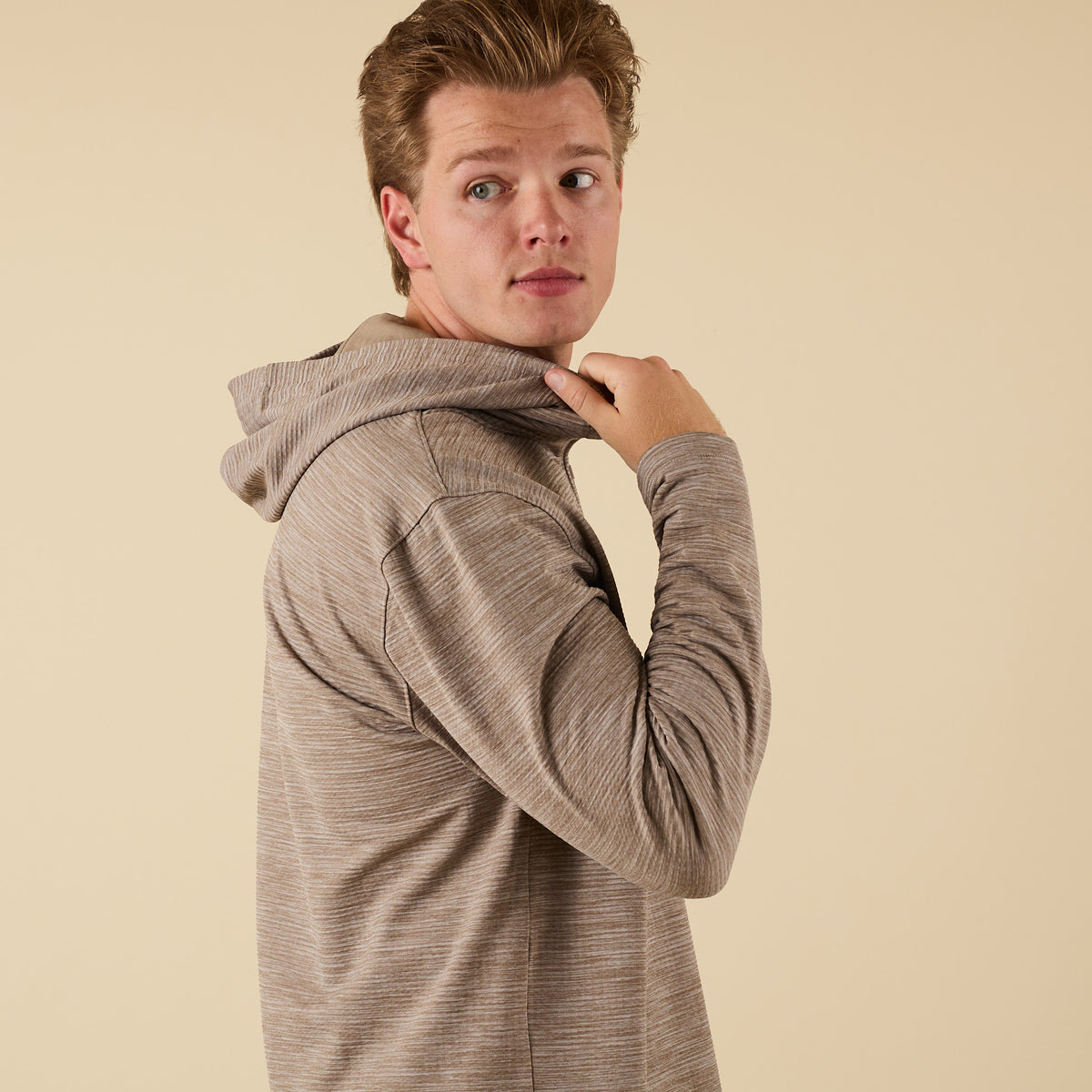 side view of Coast Apparel Lightweight Performance Quarter Zip Hoodie in lentil brown