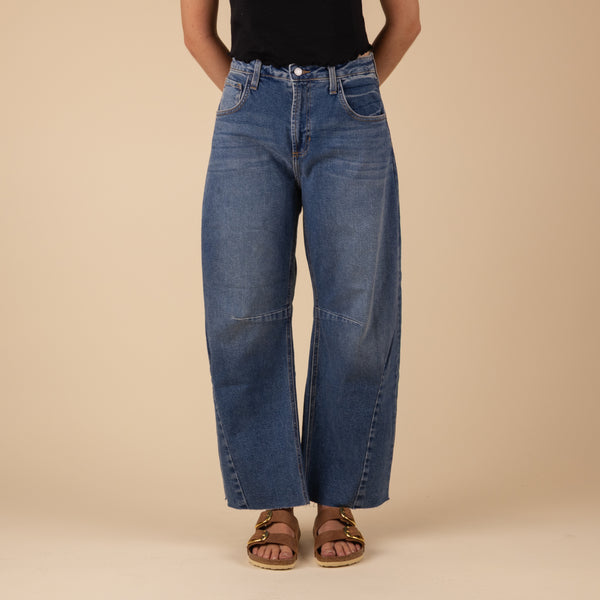 Just Black Seamed Barrel Jeans in Medium Wash, sizes 24, 25, 26, 27, 28, 29, 30, and 31, 100% cotton. 
These stretch Barrel wide-leg jeans bring major chill vibes to your look. With a vintage look, the relaxed fit shows it's all about comfort and style, they're your go-to for nailing that effortless cool. Features: Rise: 12”and Inseam: 27”, 96% Cotton, 3% Elasterell-P, 1% Spandex, made in USA, machine wash cold, lay flat to dry recommended.