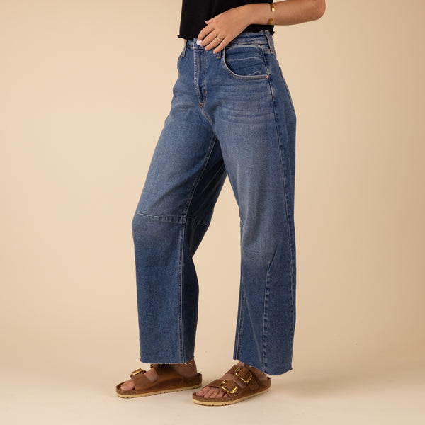 Just Black Seamed Barrel Jeans in Medium Wash, sizes 24, 25, 26, 27, 28, 29, 30, and 31, 100% cotton. 
These stretch Barrel wide-leg jeans bring major chill vibes to your look. With a vintage look, the relaxed fit shows it's all about comfort and style, they're your go-to for nailing that effortless cool. Features: Rise: 12”and Inseam: 27”, 96% Cotton, 3% Elasterell-P, 1% Spandex, made in USA, machine wash cold, lay flat to dry recommended.