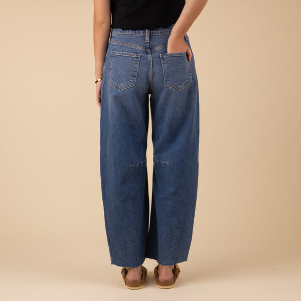 Just Black Seamed Barrel Jeans in Medium Wash, sizes 24, 25, 26, 27, 28, 29, 30, and 31, 100% cotton. 
These stretch Barrel wide-leg jeans bring major chill vibes to your look. With a vintage look, the relaxed fit shows it's all about comfort and style, they're your go-to for nailing that effortless cool. Features: Rise: 12”and Inseam: 27”, 96% Cotton, 3% Elasterell-P, 1% Spandex, made in USA, machine wash cold, lay flat to dry recommended.
