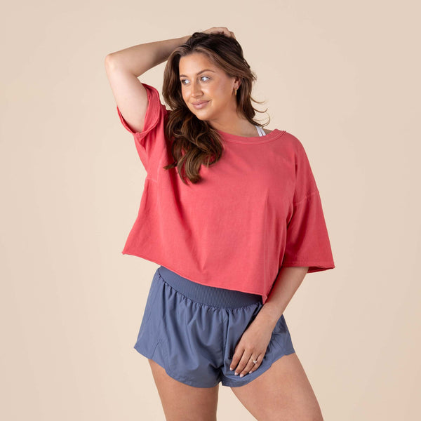  Free People Movement Short Sleeve Inspire Tee in winterberry – lightweight, breathable athletic t-shirt with a relaxed fit and crew neckline.