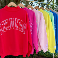 lulu mac sweatshirts hanging on a rack
