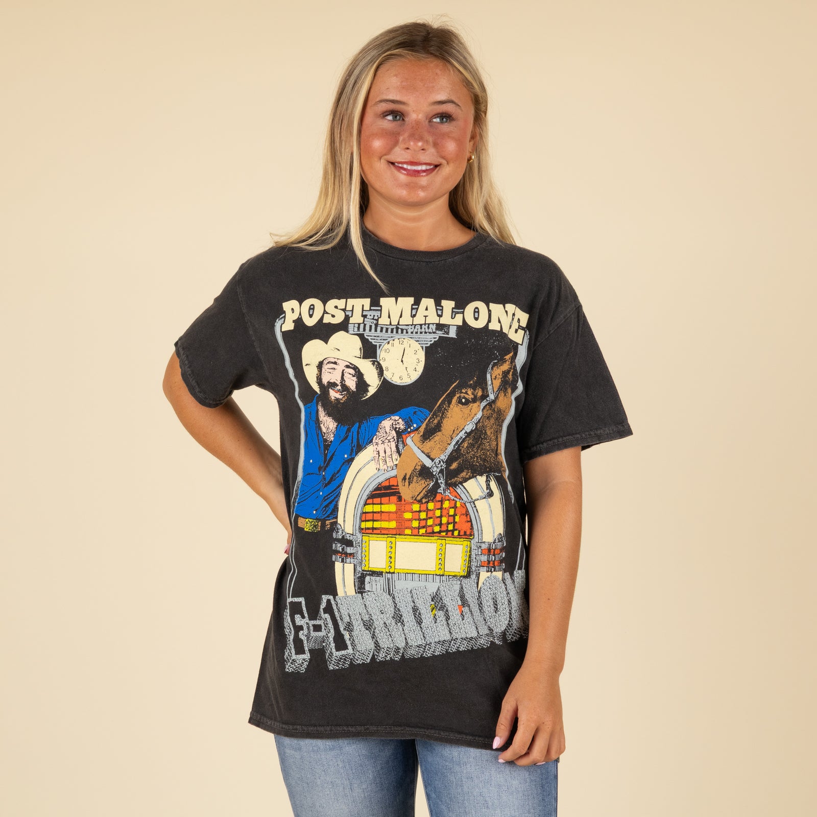 Woman wearing a Post Malone band t-shirt.