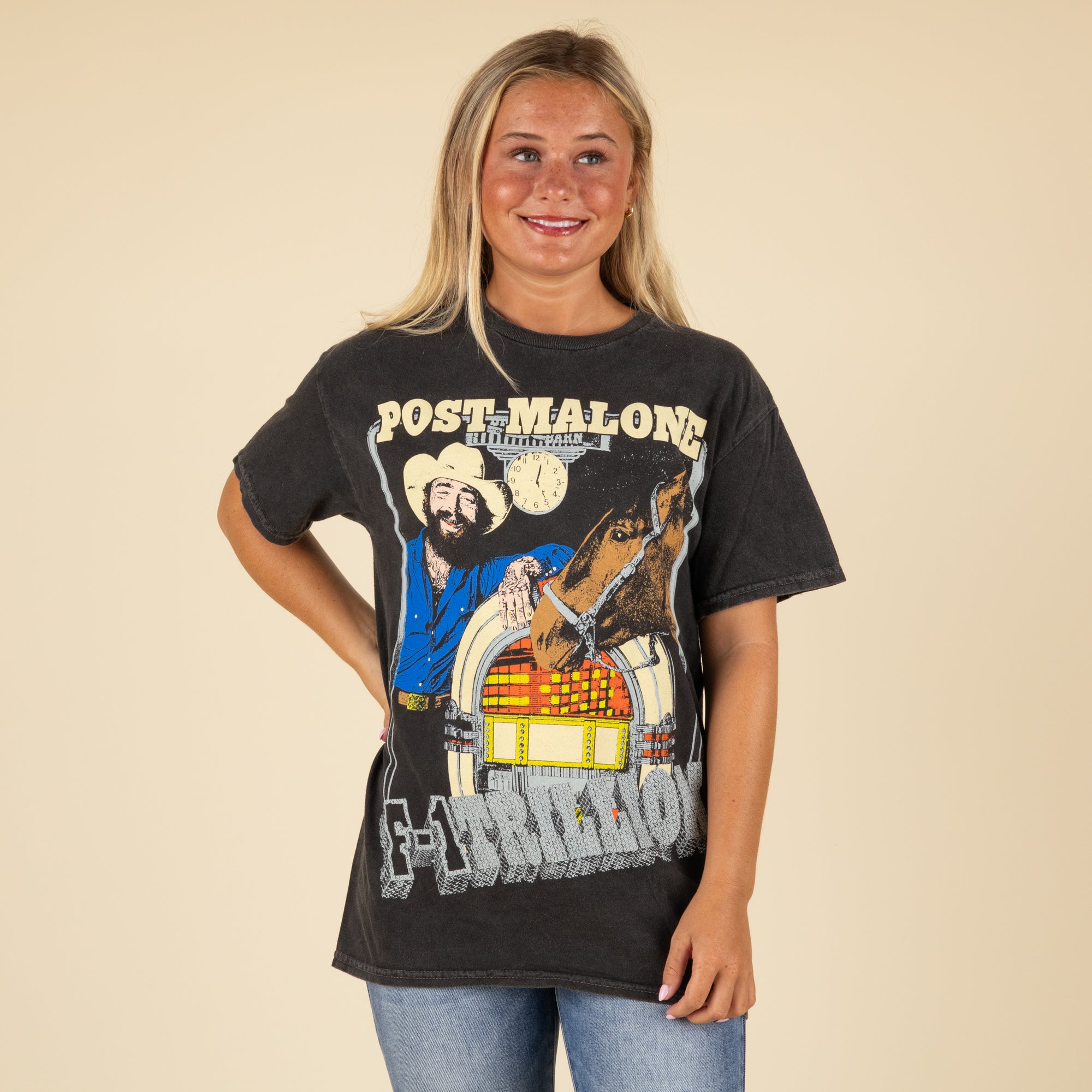 Woman wearing a Post Malone band t-shirt.