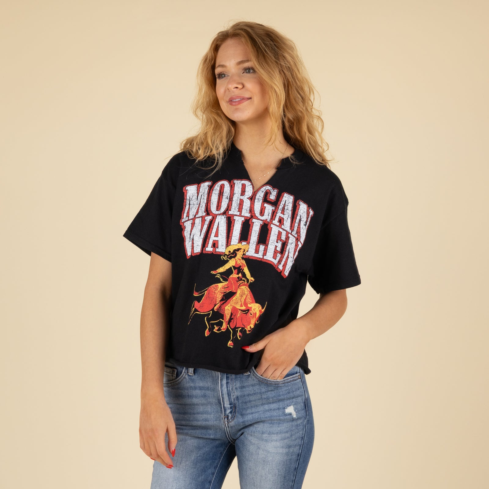 Woman wearing a Morgan Wallen black t-shirt.