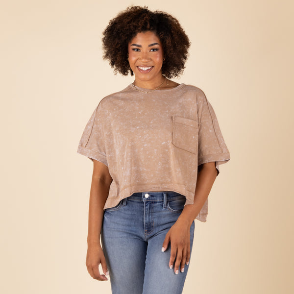  Very J Boxy Top in Taupe on a woman posing in front of a neutral background.