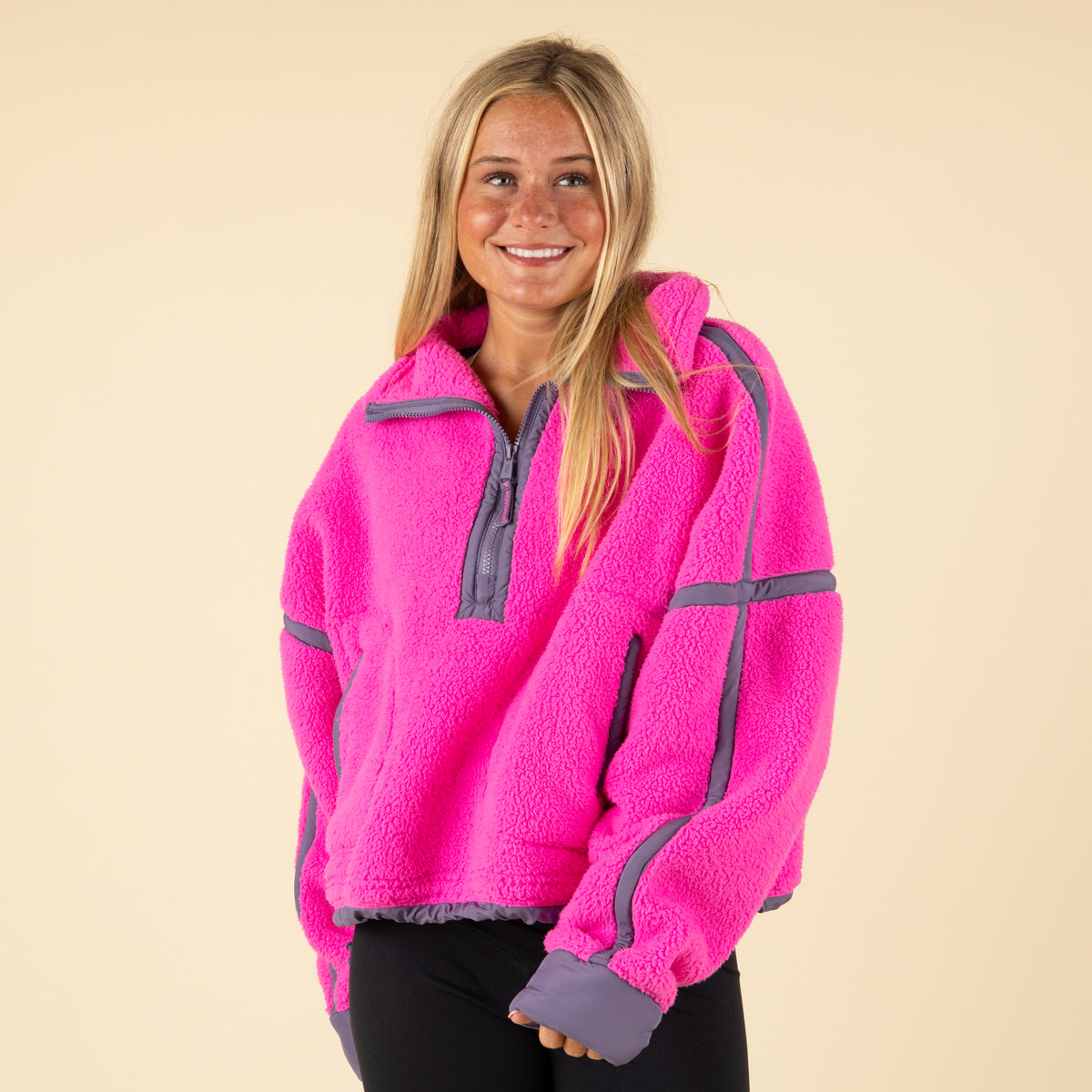 Model wearing FP Movement Mountain High Half Zip Pullover in Fuchsia