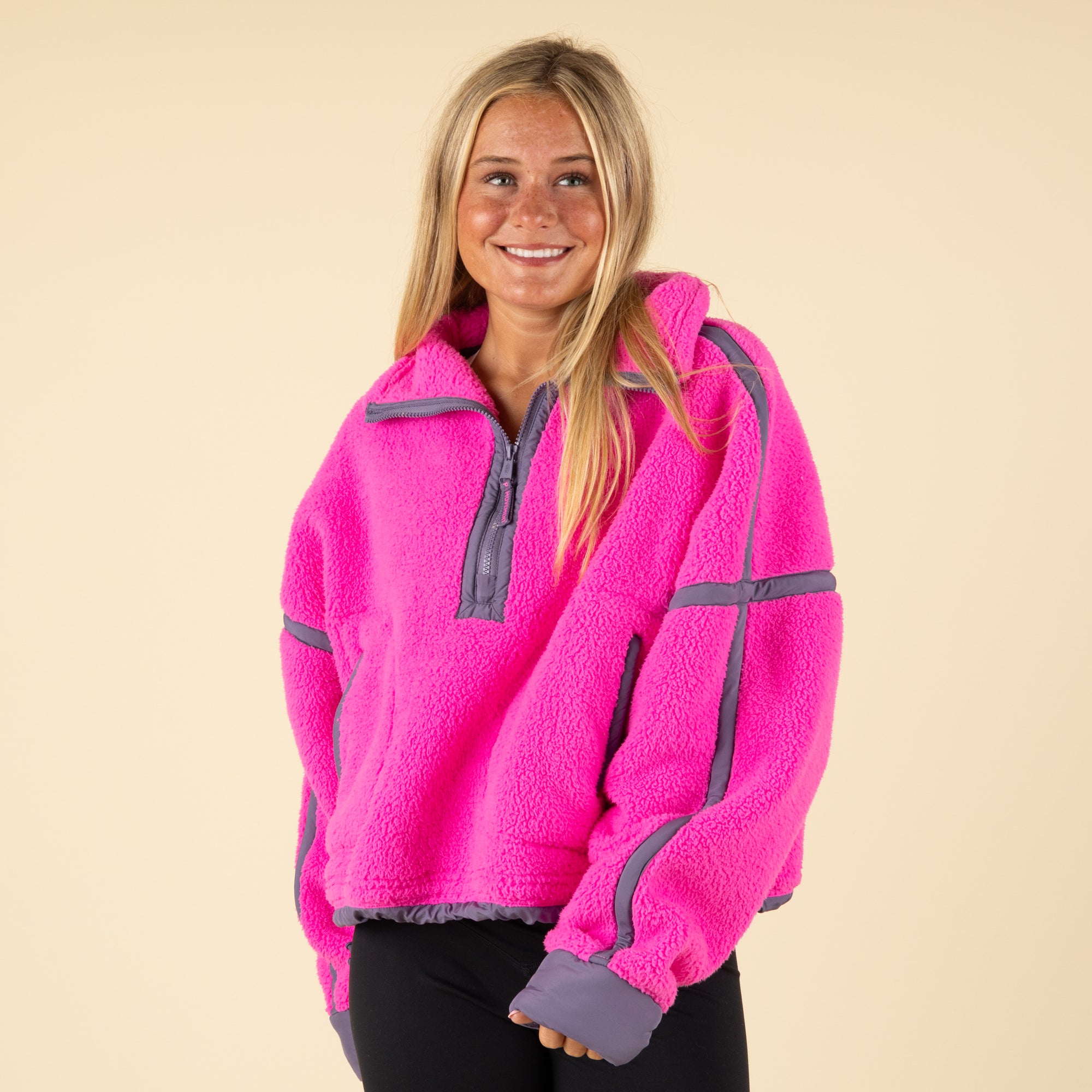 Model wearing FP Movement Mountain High Half Zip Pullover in Fuchsia