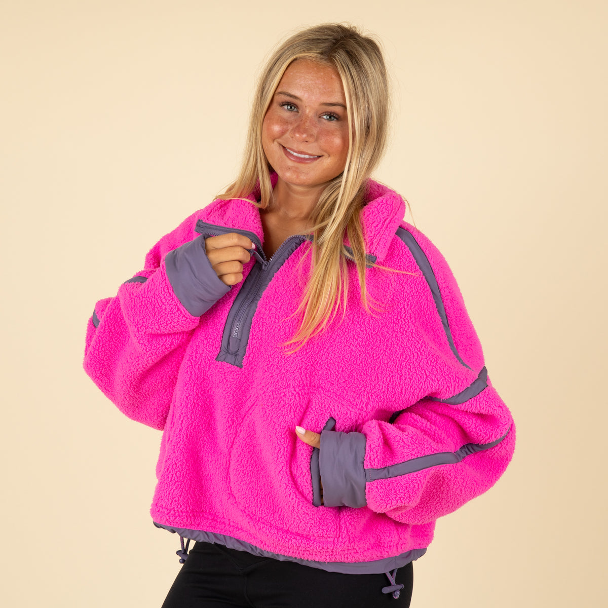 Model wearing FP Movement Mountain High Half Zip Pullover in Fuchsia