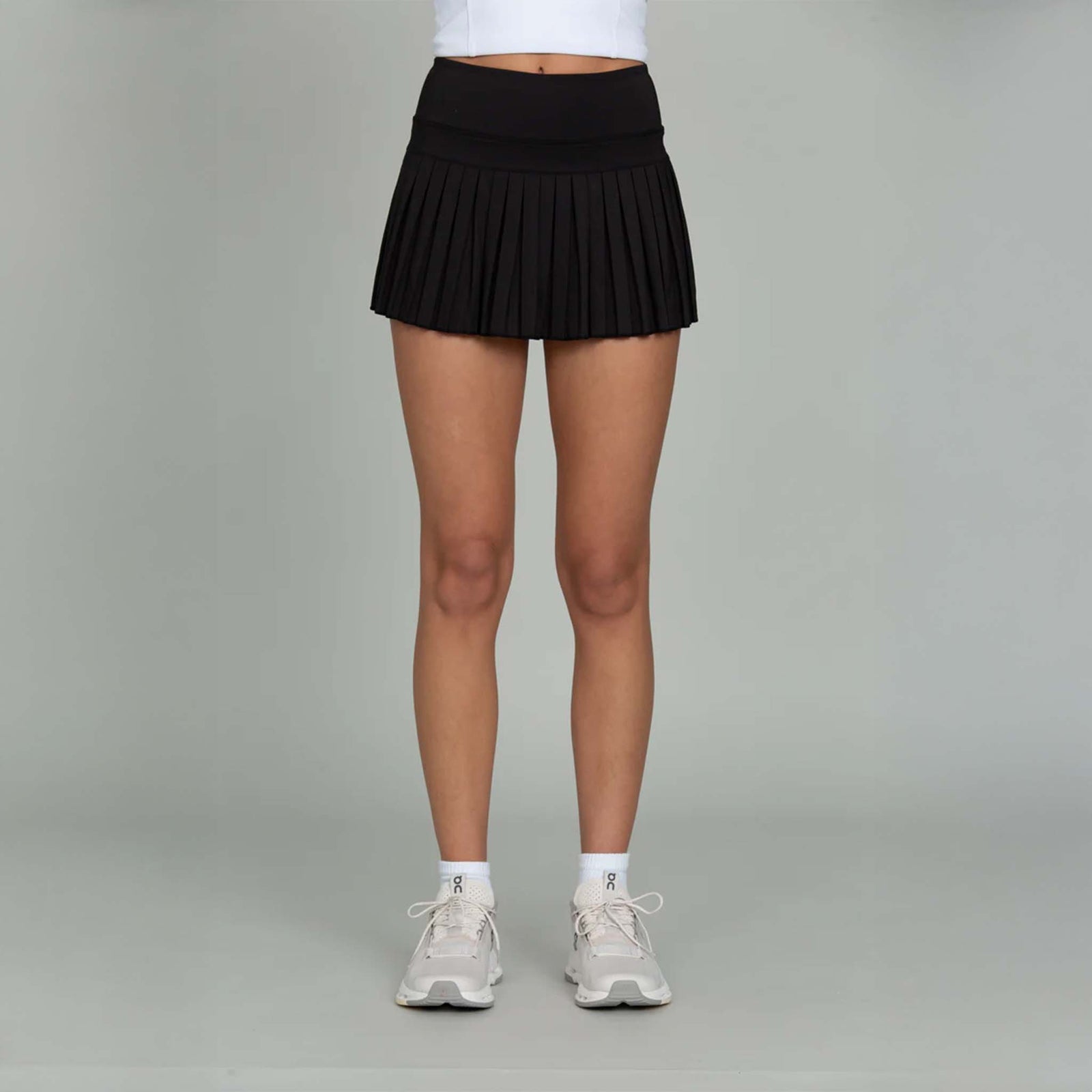 Gold Hinge Pleated High-Waisted Tennis Skort in Black