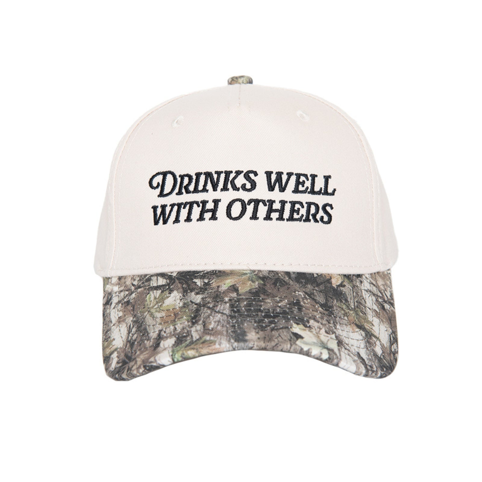 Tan trucker hat with “Drinks Well With Others” embroidered text and camo print brim, centered product image on white background.