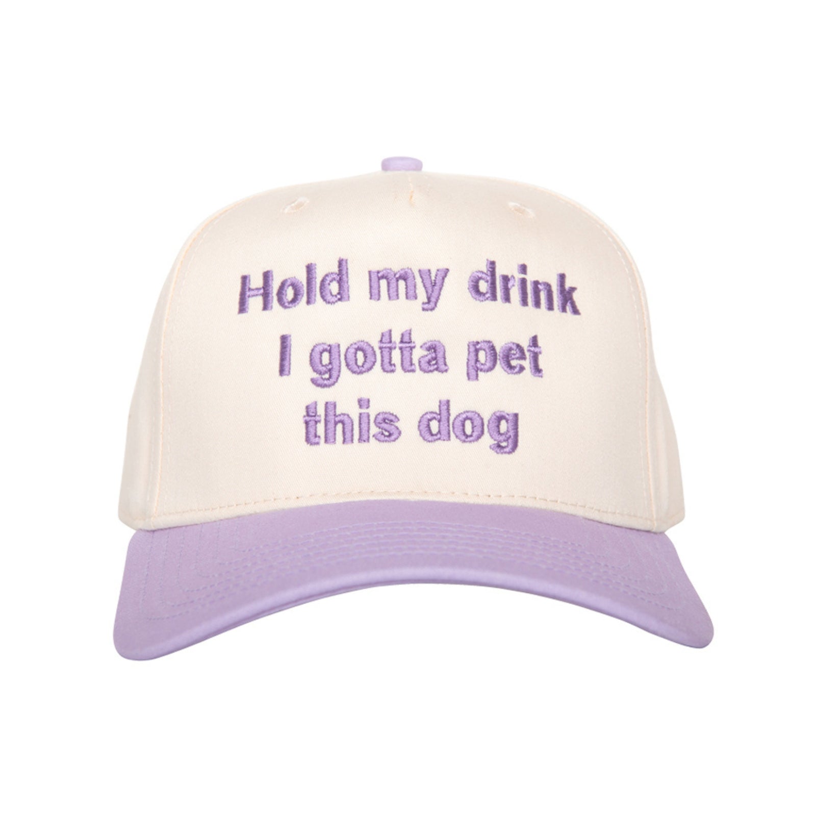 Tan and lavender trucker hat with embroidered text and curved brim, centered product image on white background.