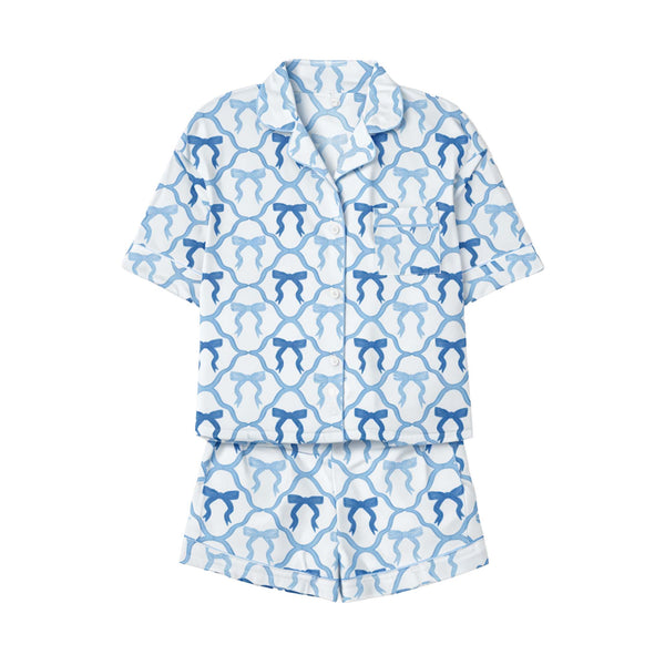 Youth blue bow print pajama set with short sleeve button-up top and matching shorts.