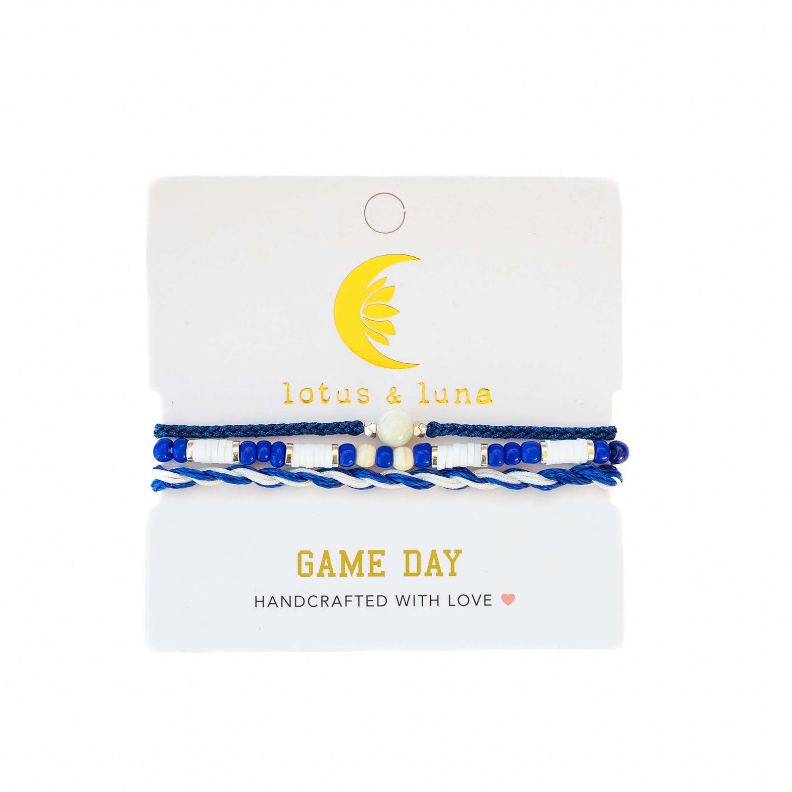 Lotus & Luna Game Day bracelet set with blue and white beads, pearl accent, and twisted string, displayed on packaging.