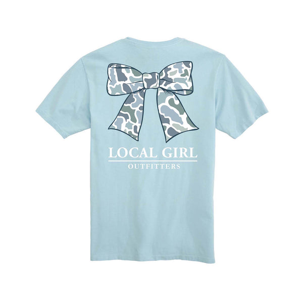 Local Girl Outfitters Youth tee in light blue with camo bow graphic and logo on back. Short sleeve. Available in youth sizes XS–XL. 