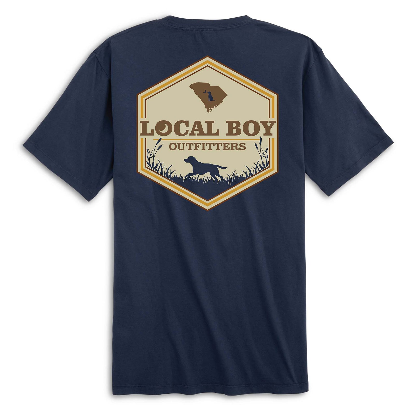 Back view of navy short sleeve t-shirt with large hexagon-shaped graphic featuring a brown silhouette of South Carolina, “Local Boy Outfitters” text, and a black silhouette of a dog standing in grass with cattails.