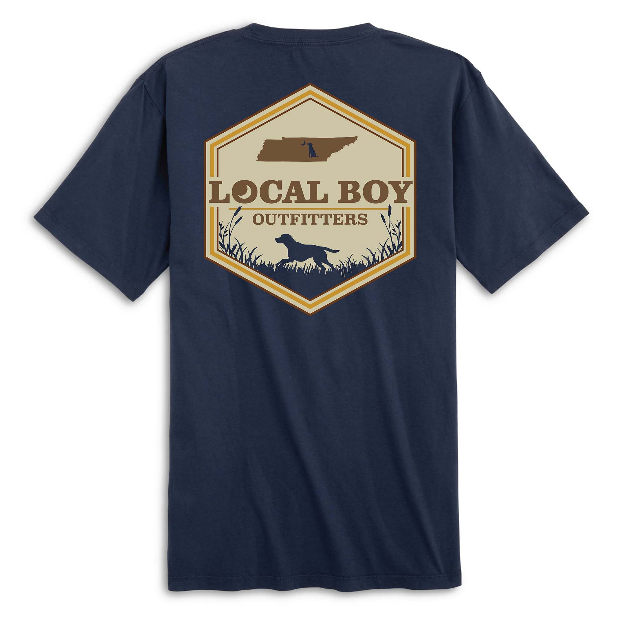 Back view of navy short sleeve t-shirt with large hexagon-shaped graphic featuring a brown silhouette of Tennessee, “Local Boy Outfitters” text, and a black silhouette of a dog standing in grass with cattails.