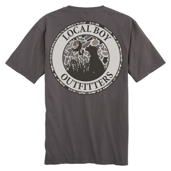 Local Boy Outfitters Gray Short Sleeve T-Shirt with circular camo logo featuring dog silhouette in marsh grass under crescent moon and Local Boy Outfitters text.