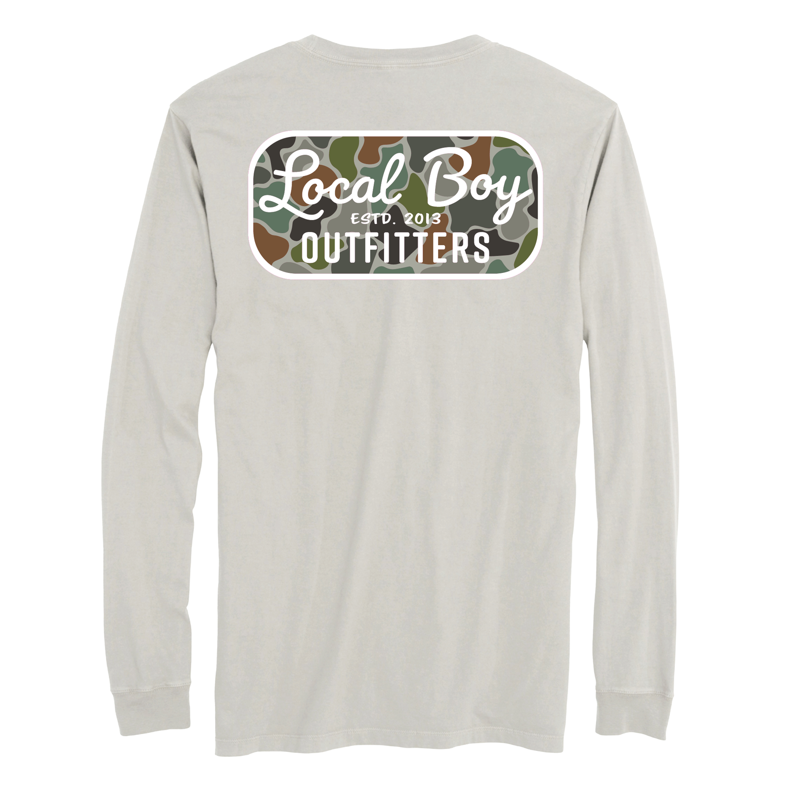 Local Boy Outfitters long sleeve t-shirt in light silver featuring a back graphic with white “Local Boy Outfitters” text over a green, brown, and tan camouflage background with “ESTD. 2013” centered in the design.
