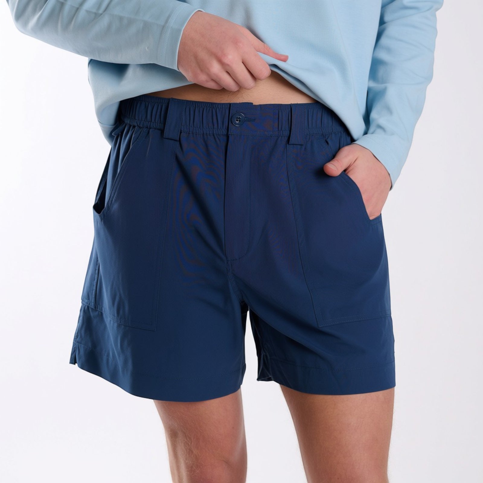 Front view of navy chum fishing shorts.