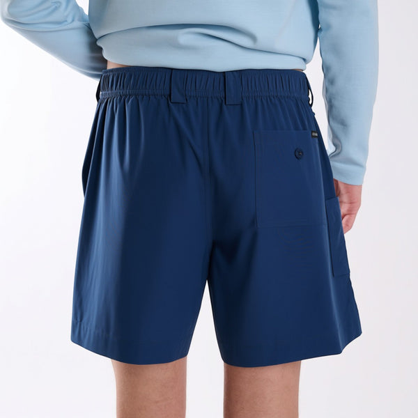 Back view of navy fishing shorts.