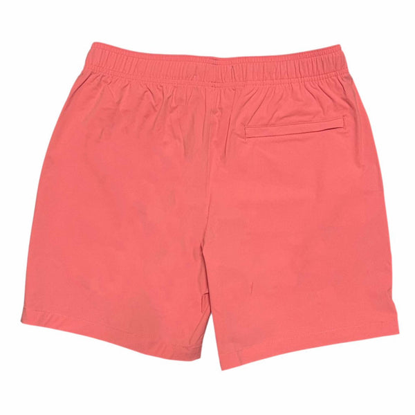 back view of Local Boy Outfitters Men's Bayview swim shorts in bright coral showing one back pocket 