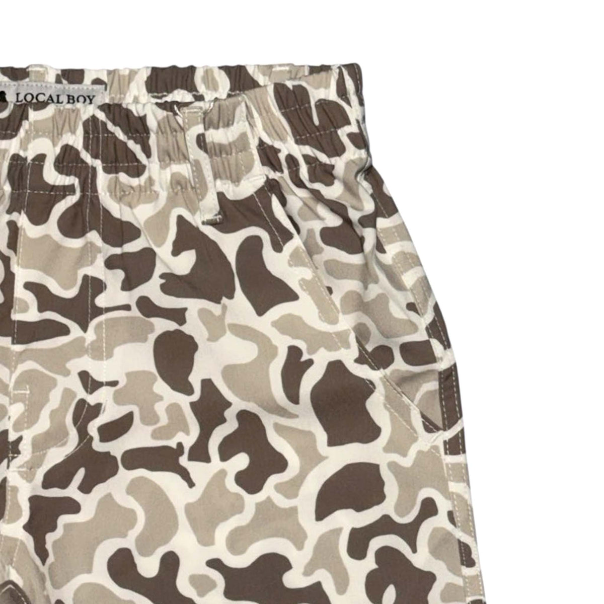 close up of Front Local Boy Outfitters Youth Volley Shorts in palmettoflage with elastic waist and two pockets