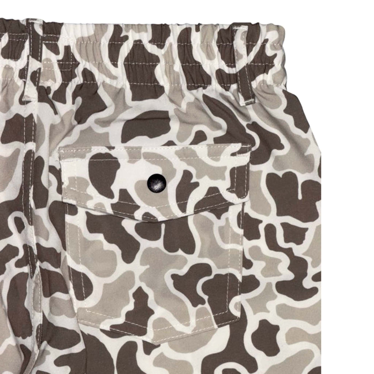 close up of back of Local Boy Outfitters Youth Volley Shorts in palmettoflage with elastic waist and one snap pocket