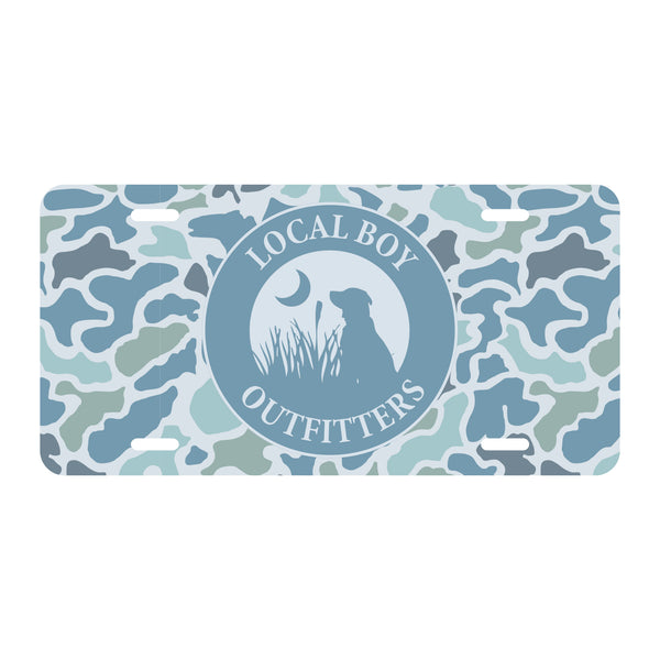 License plate with blue camouflage pattern and 'Local Boy Outfitters' logo