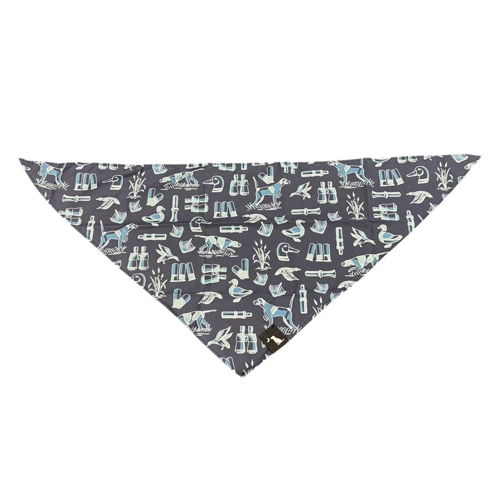 Navy blue triangle dog bandana with light blue and white duck hunting-themed illustrations, including dogs, ducks, binoculars, and decoys.