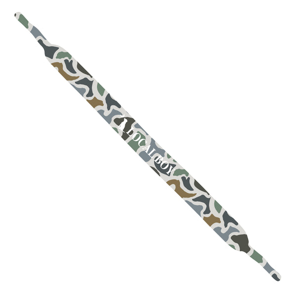 Camouflage-patterned sunglass strap with Local Boy Outfitters branding in the middle shown on a white background