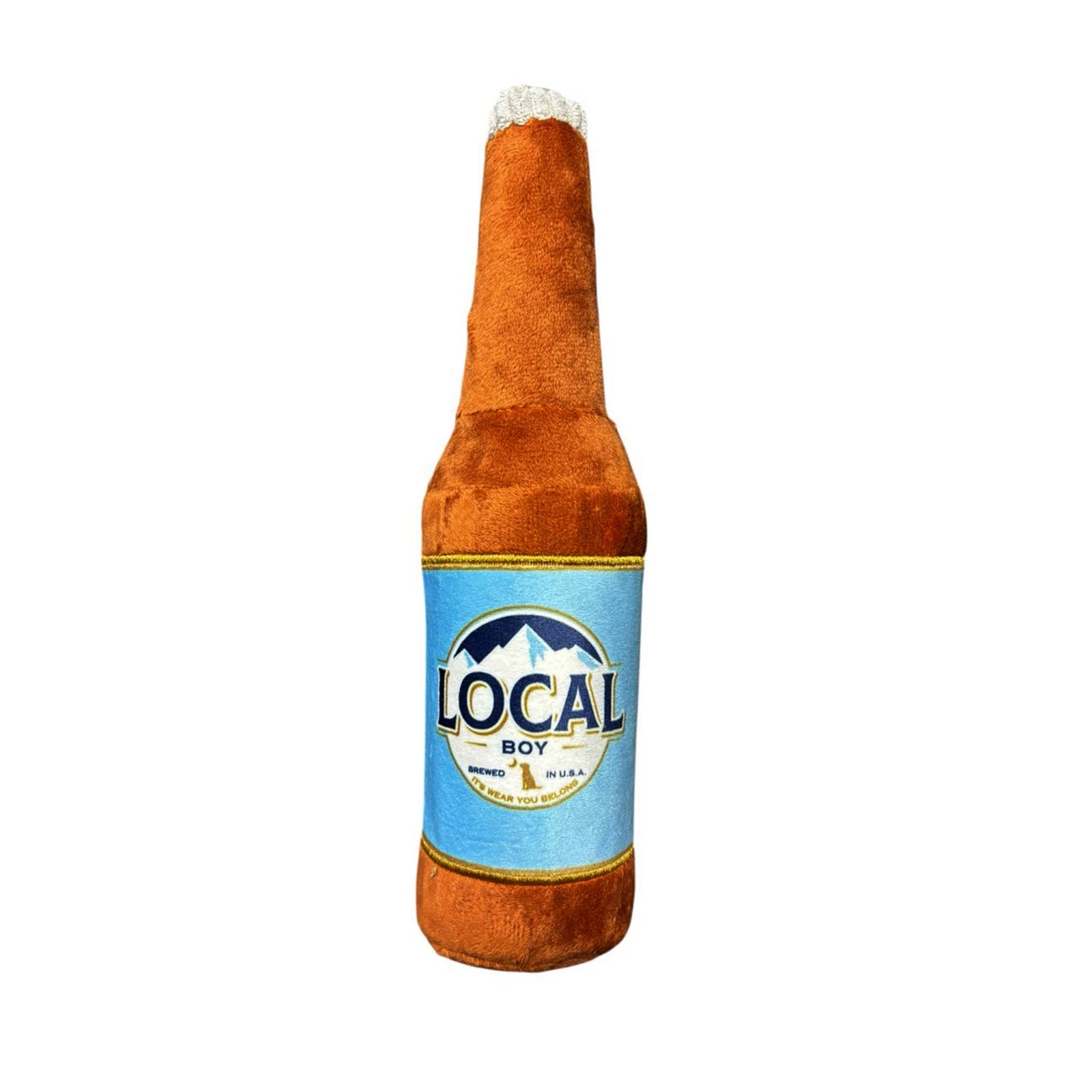 Full view of a brown plush toy shaped like a beer bottle with a blue “Local Boy” label and embroidered foam top.